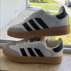 adidas White and Black Platform Gum-Soled Sneakers